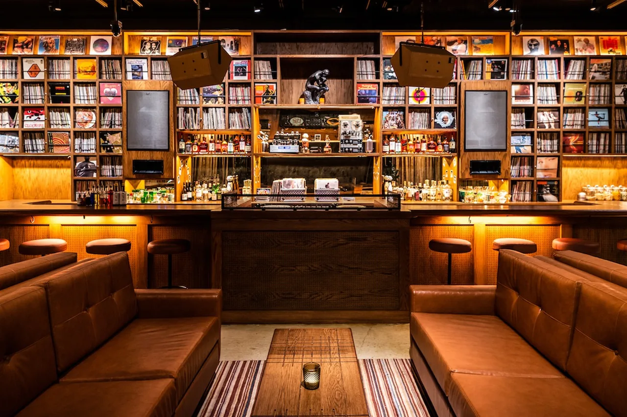 Dante's HiFi vinyl listening bar, record-lined walls